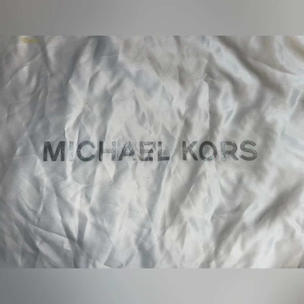 Michael Kors garment bag.
